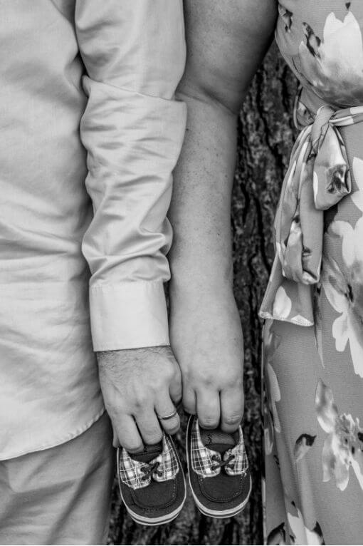 Mel and Alex: Maternity holding hands